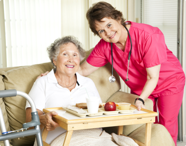 caregiver assisting elder woman